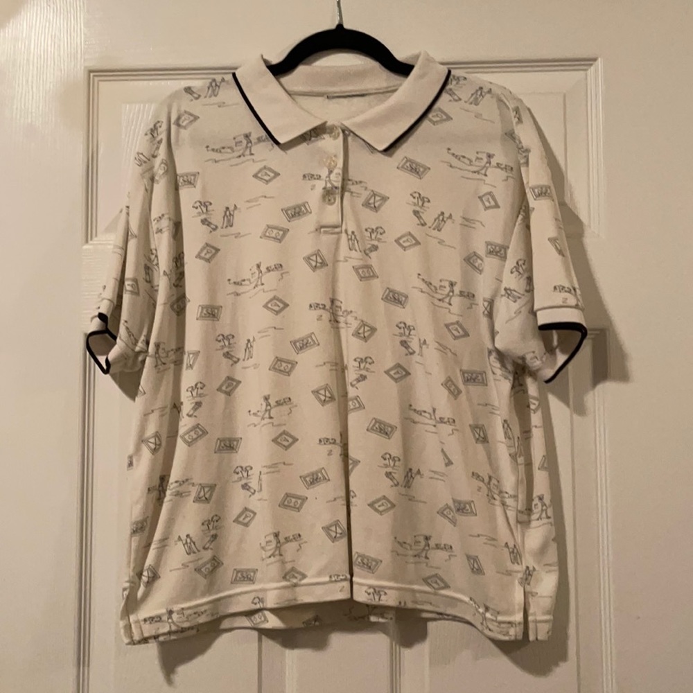 White shirts with golfing pictures